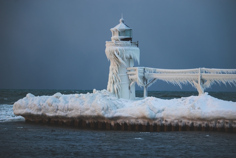 seeing frozen lighthouses is one of the best winter activities in Michigan