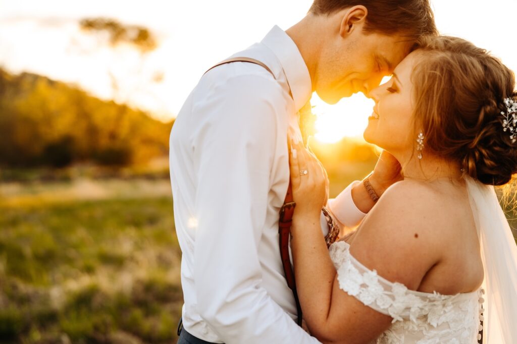 Looking for Red Wing wedding venues? Explore a historic barn, outdoor ceremony spaces, and on-site lodging for couples. Pictured a stunning bride and groom on their wedding day at Round Barn Farm from Tessa June Photography