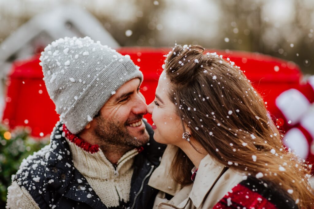 Discover Frankenmuth carriage rides and other romantic things to do in Frankenmuth for couples planning a Midwest getaway. Young couple enjoying a horse ride