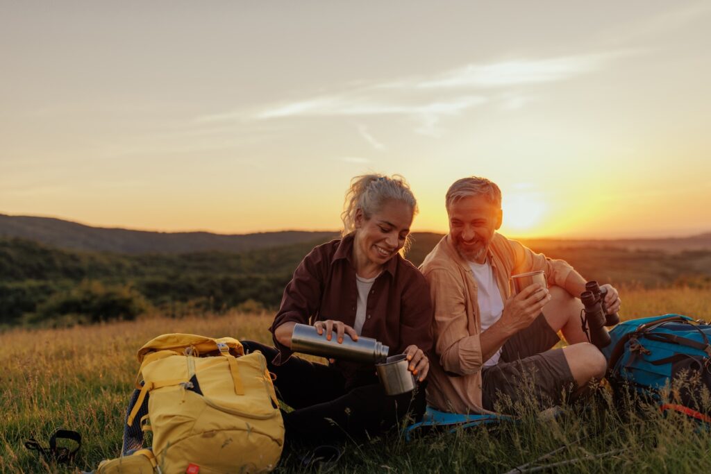 couple enjoying weekend getaways from NYC in the Adirondacks on a hike