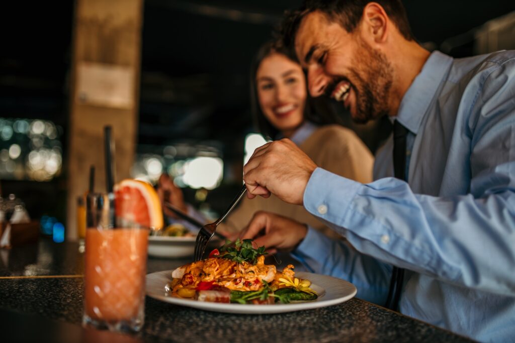 A couple enjoy a lovely meal at one of the best restaurants in Madison Wisconsin