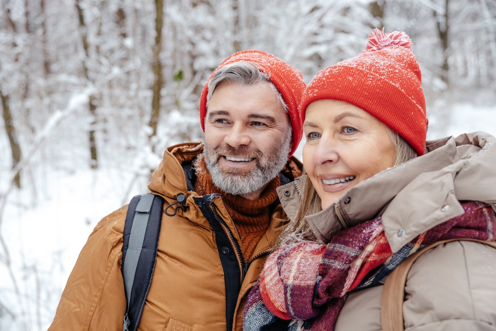 A middle age couple enjoying winter getaways at our Cabins, one of the most romantic getaways in Washington State