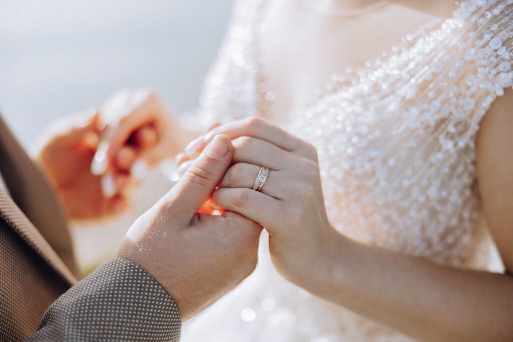 a couple holding hands at one of the best Vermont wedding venues