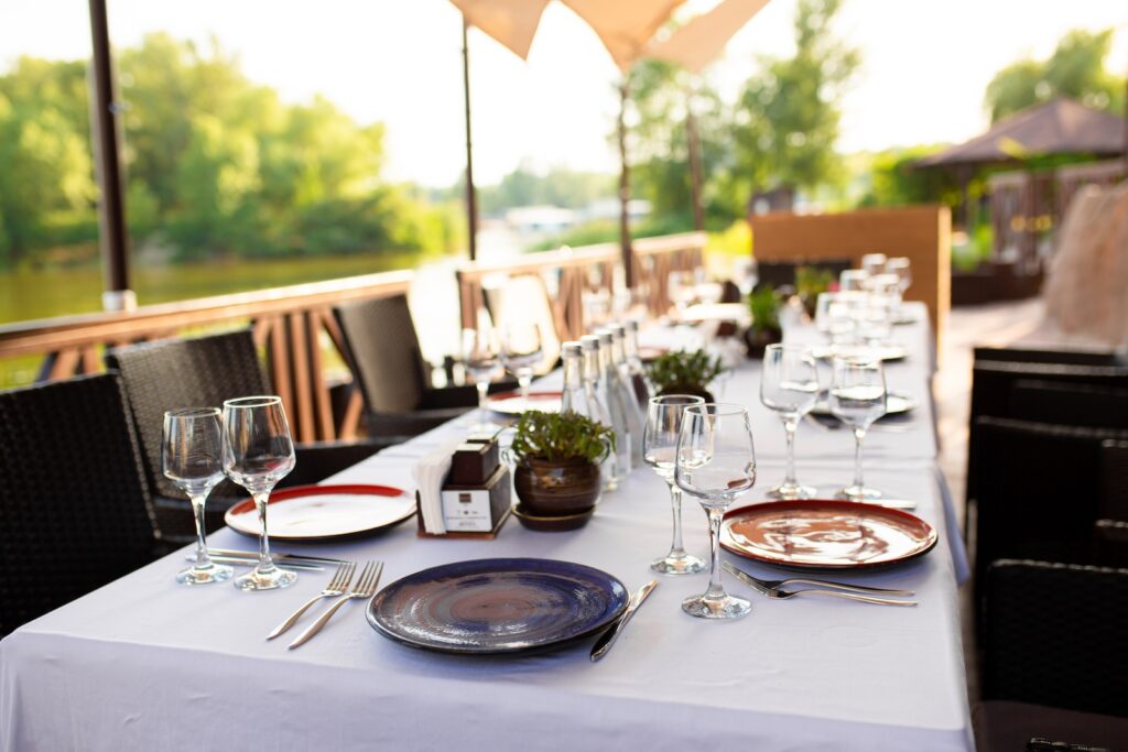 Stylish table setting at one of the best Deep Creek Lake restaurants with outdoor dining