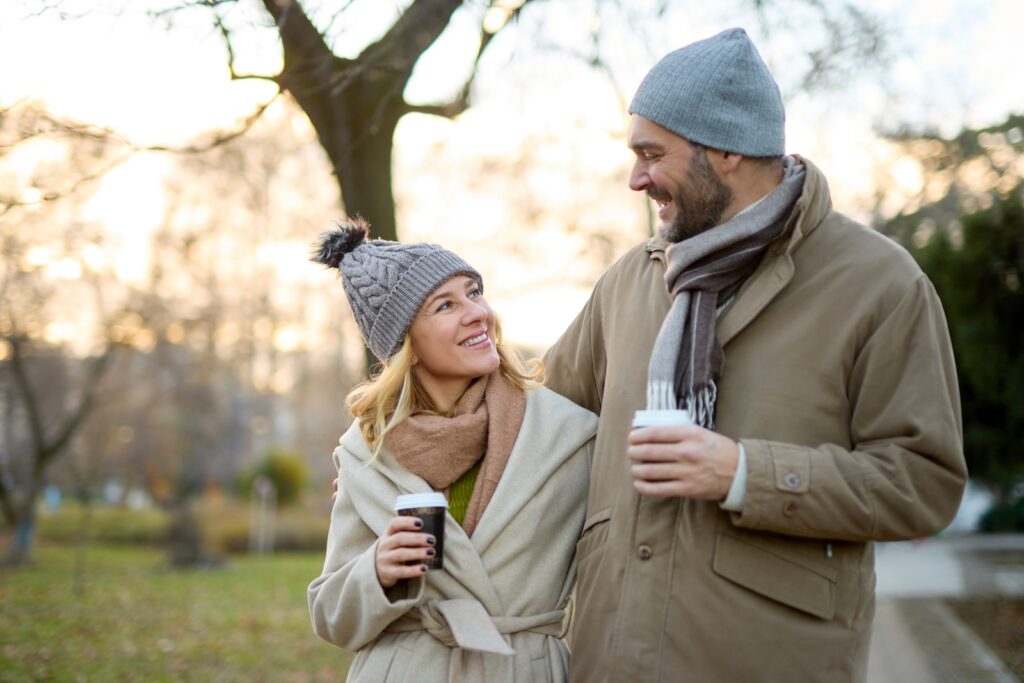 couple enjoying a winter walk during the best winter weekend getaway in the Midwets