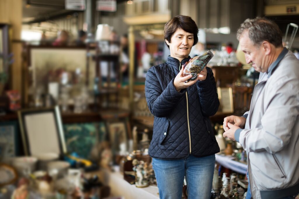 one of the Best Things to Do in Hocking Hills Besides Hiking is antique shopping, older couple at a antique shop