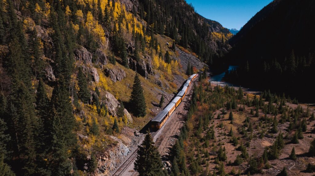 A train going through the mountains, one of the best things to do in Durango Colorado.