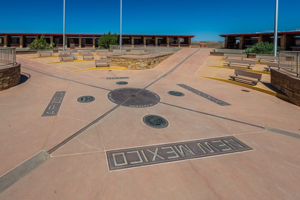 Stand at the Four Corners Monument while you're visiting us in Farmington, NM