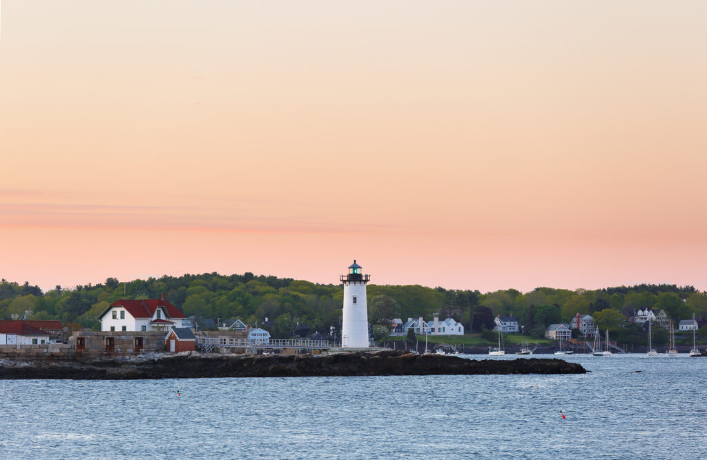 Portsmouth Harbor Lighthouse on New Hampshire Coast at sunset