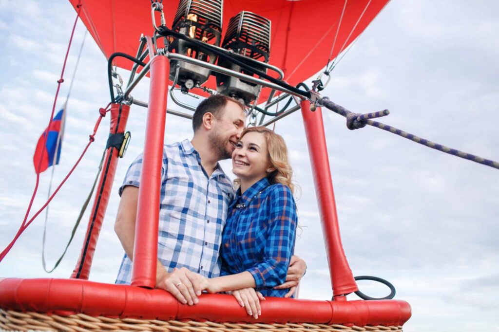 couple enjoying one of the most memorable hot air balloon rides in Albuquerque