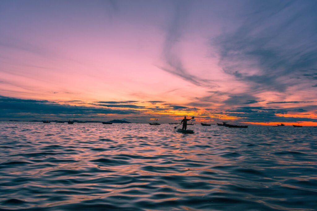 Paddling on lake granbury at sunset is one of the best things to do in Granbury, TX