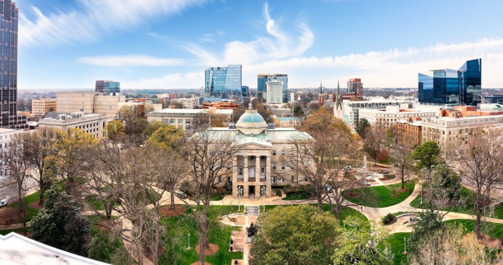 There are so many things to do in Raleigh NC. Raleigh Skyline and North Carolina Capital building.