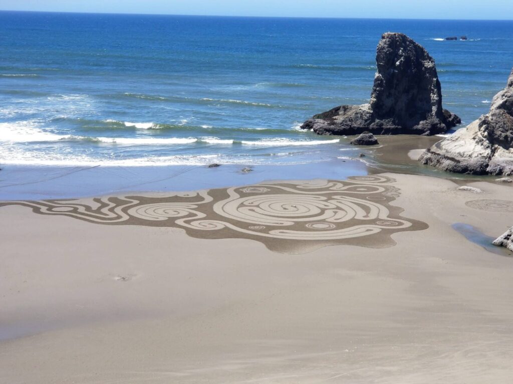 Intricate Sand art on the beach during Circles on the Sand in Bandon OR