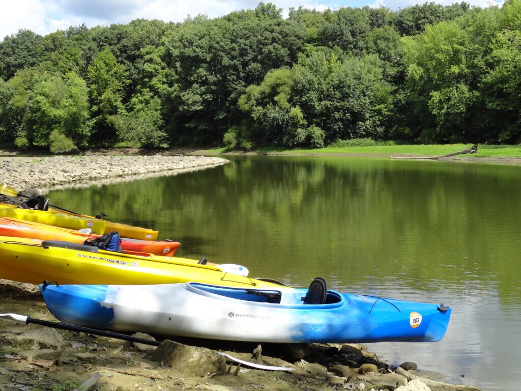 kayaks perched on the shore of the Shenango River Lake
