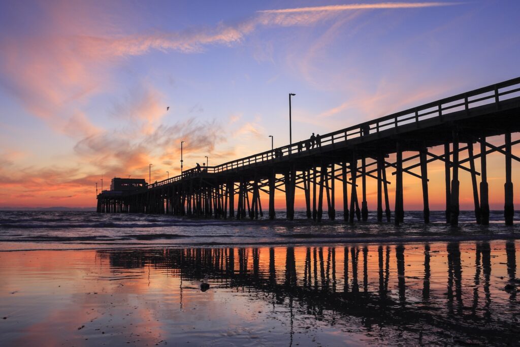 Sunset at Newport beach pier, California, one of the best things to do in Orange County for couples