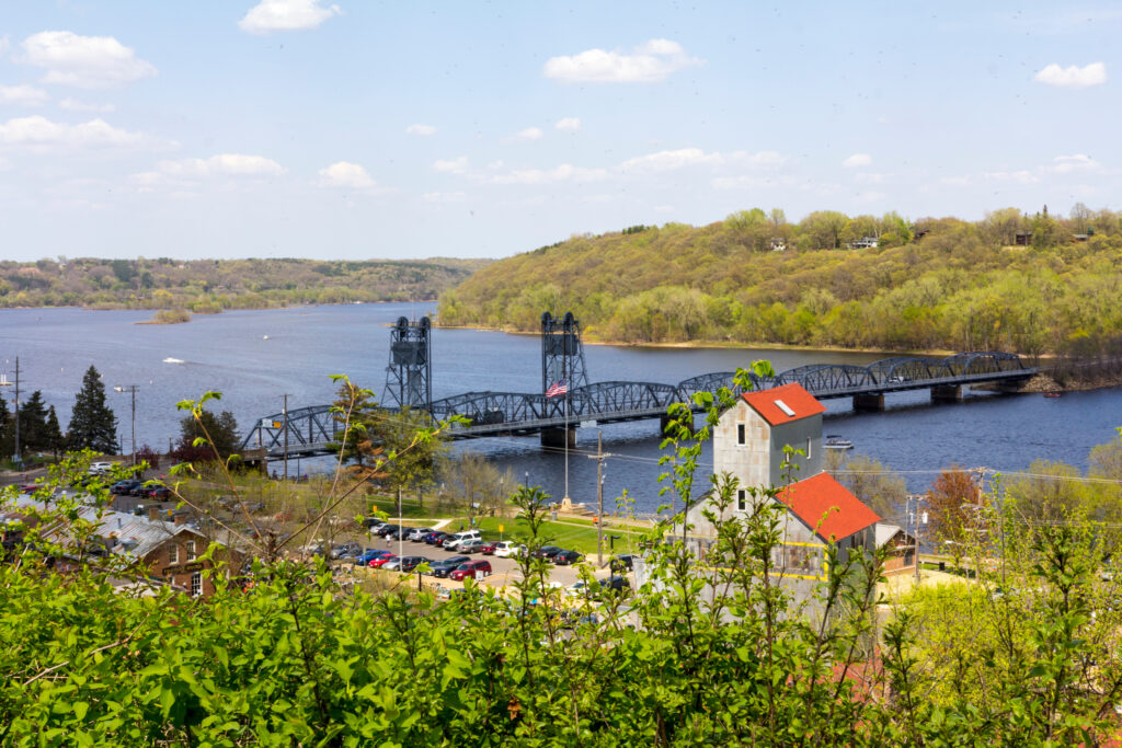 The Stillwater Lift Bridge, St. Croix River, and the bluffs in Wisconsin. Visit the Lift Bridge Brewery in Stillwater.