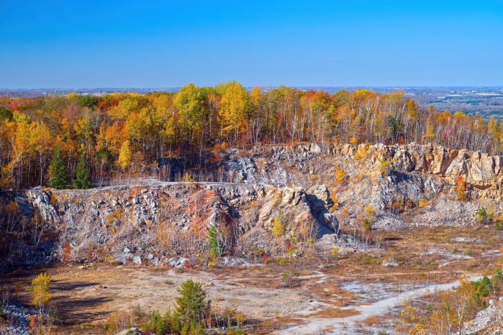 An abandoned quartzite quarry in Rib Mountain State Park in Wausau, Wisconsin, with fall foliage.