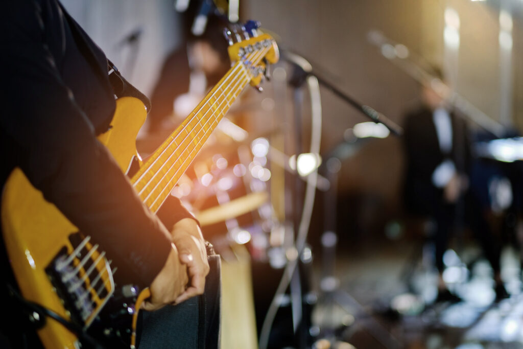 One of the newest Durango Events premieres this fall: the San Juan Songwriters Festival. Close up of hand playing guitar.