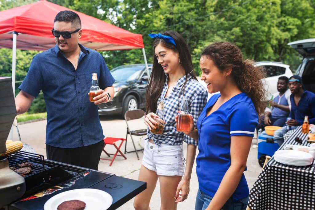 Friends tailgating at a Penn state football game, it's easy when you read our Beaver Stadium Parking guide