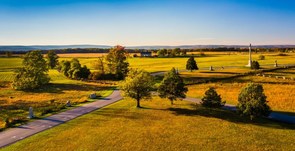 View of battlefields from the Pennsylvania Monument in Gettysburg, Pennsylvania. A historic stop for your next Gettysburg Getaways