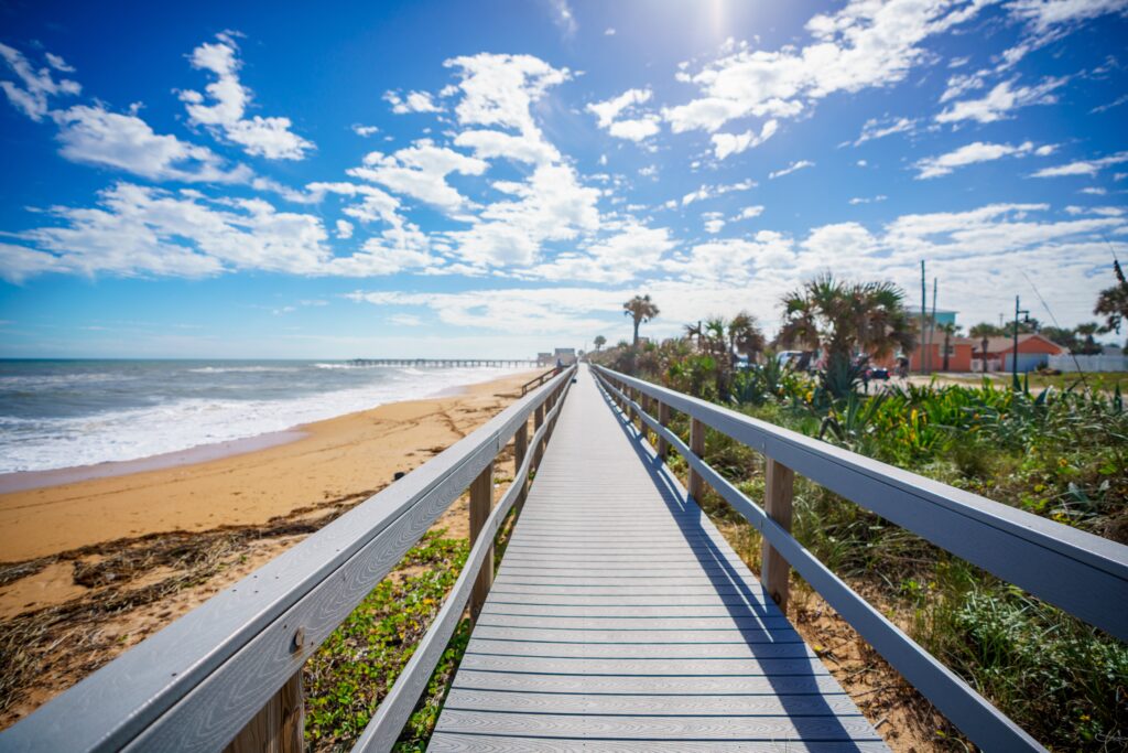 Flagler Beach Boardwalk, cinnamon color sand. Best time to visit Florida