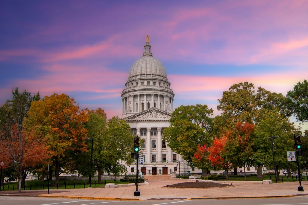 One of the best fall things to do in Madison, WI, is explore the Wisconsin State Capital building with fall colors framing the historic building